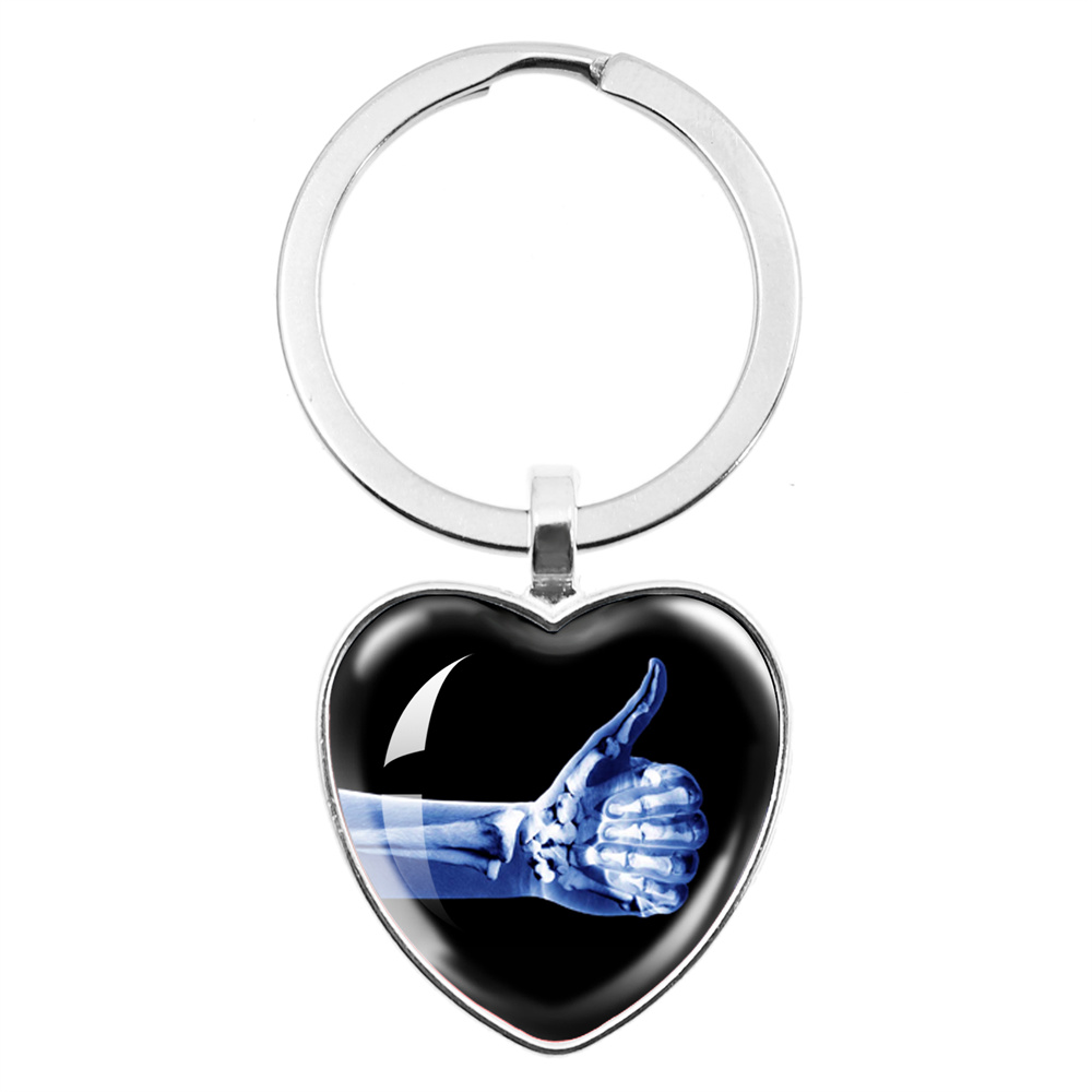 Xbody Health & Wellness - X-ray Film Peach Heart Keychain Human